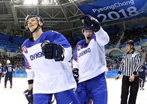 GANGNEUNG, SOUTH KOREA - FEBRUARY 16: Slovakia's Marek Daloga #71 and Michal Cajkovsky #56 sakte to the bench after a first period goal by Andrej Kudrna #18 (not shown) during preliminary round action at the PyeongChang 2018 Olympic Winter Games. (Photo by Andre Ringuette/HHOF-IIHF Images)

