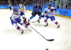 GANGNEUNG, SOUTH KOREA - FEBRUARY 20: Korea's Minho Cho #87 plays the puck while Won Jun Kim #6 keeps close watch on Finland's Joonas Kemppainen #23 during qualifaction round action at the PyeongChang 2018 Olympic Winter Games. (Photo by Andre Ringuette/HHOF-IIHF Images)

