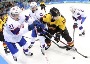 GANGNEUNG, SOUTH KOREA - FEBRUARY 18: Germany's Patrick Hager #50 battles for the puck with Norway's Steffen Thoresen #21, Mathis Olimb #46 and Ken Andre Olimb #40 during preliminary round action at the PyeongChang 2018 Olympic Winter Games. (Photo by Andre Ringuette/HHOF-IIHF Images)


